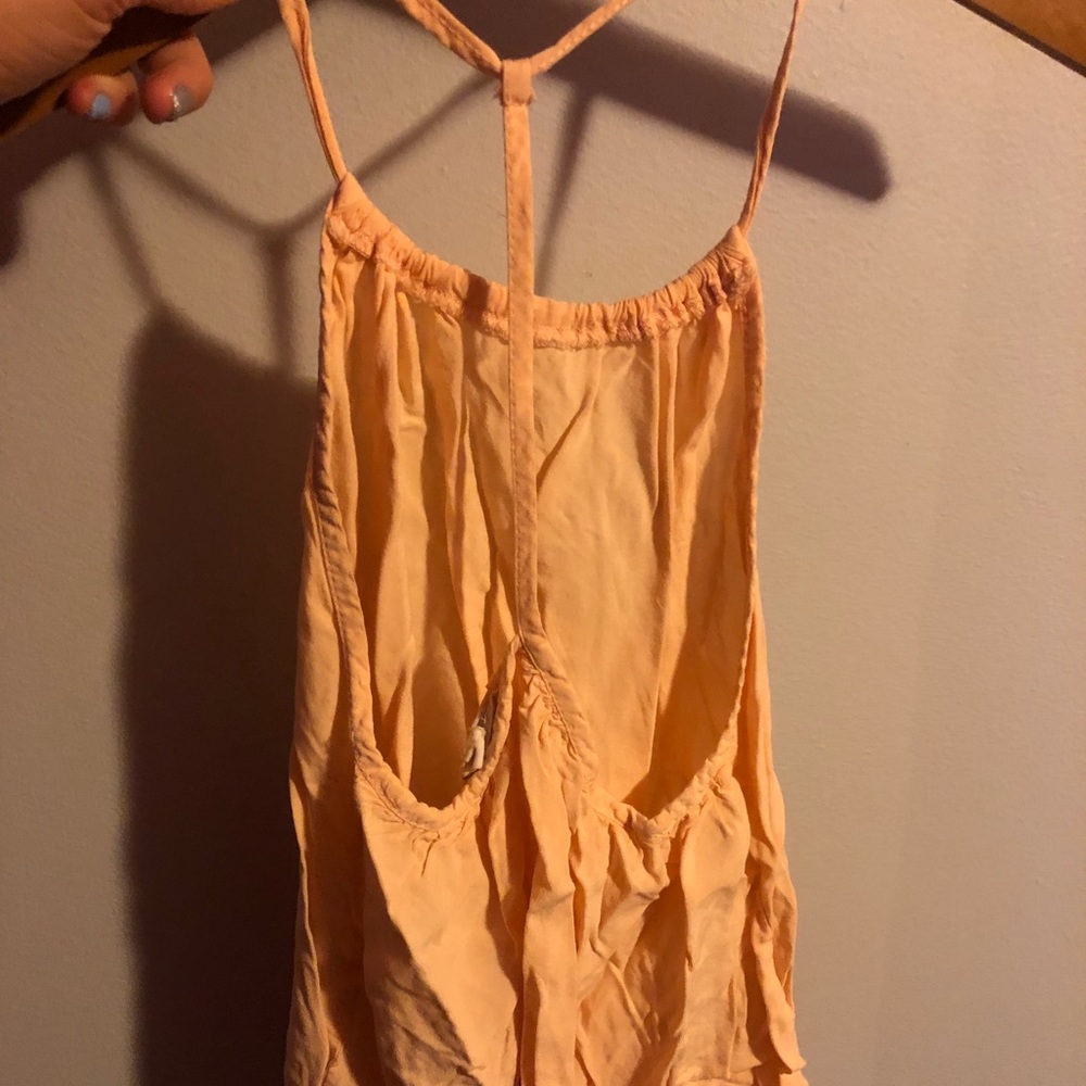 Cute, pink tank with lace detail.